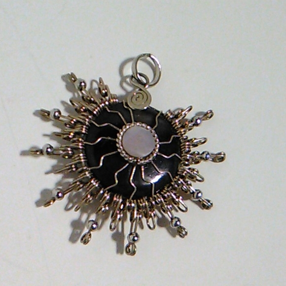 Jewelry - Nwot  Hard plastic charm with metal wire